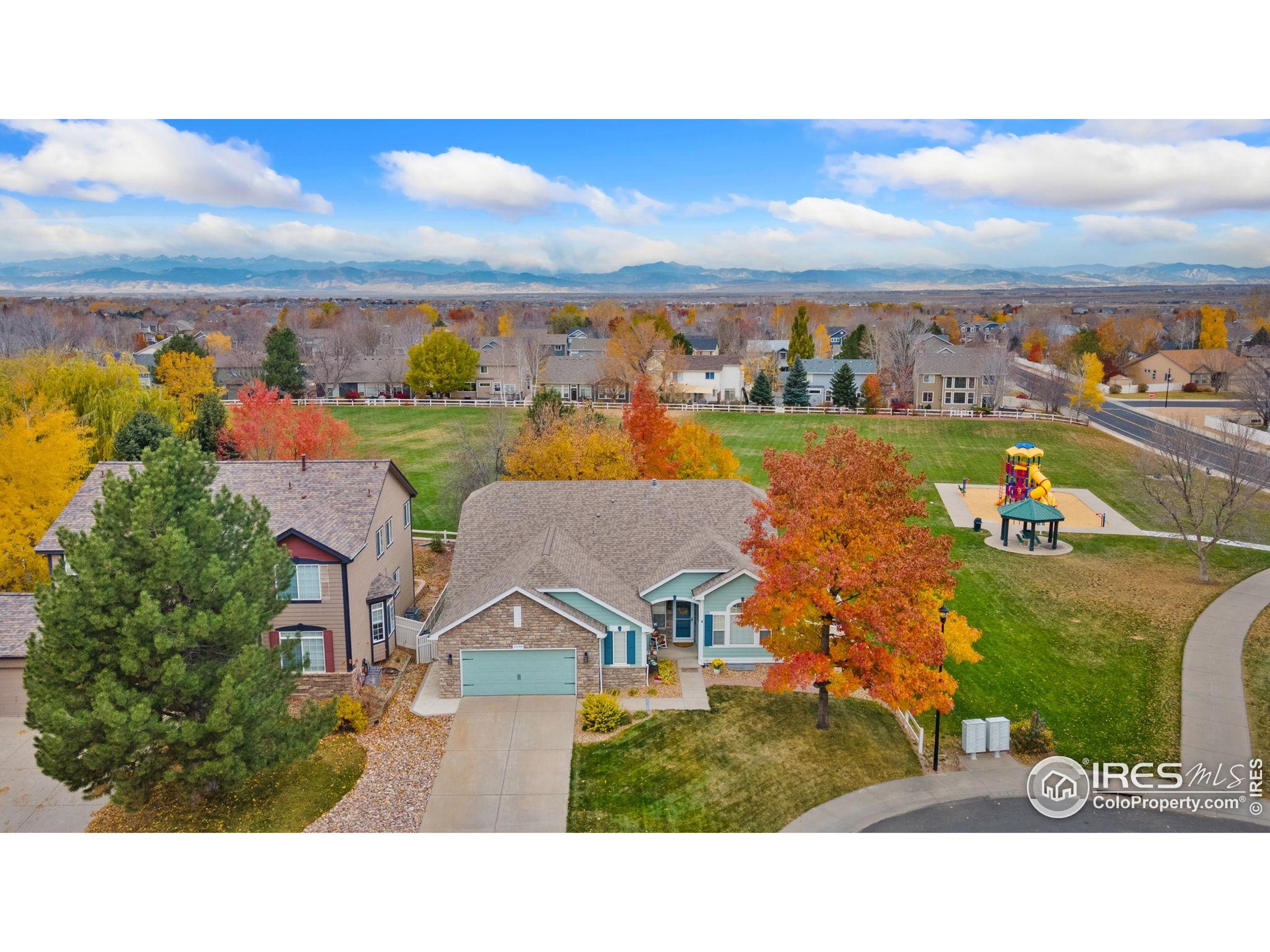 an aerial view of a house with a garden
