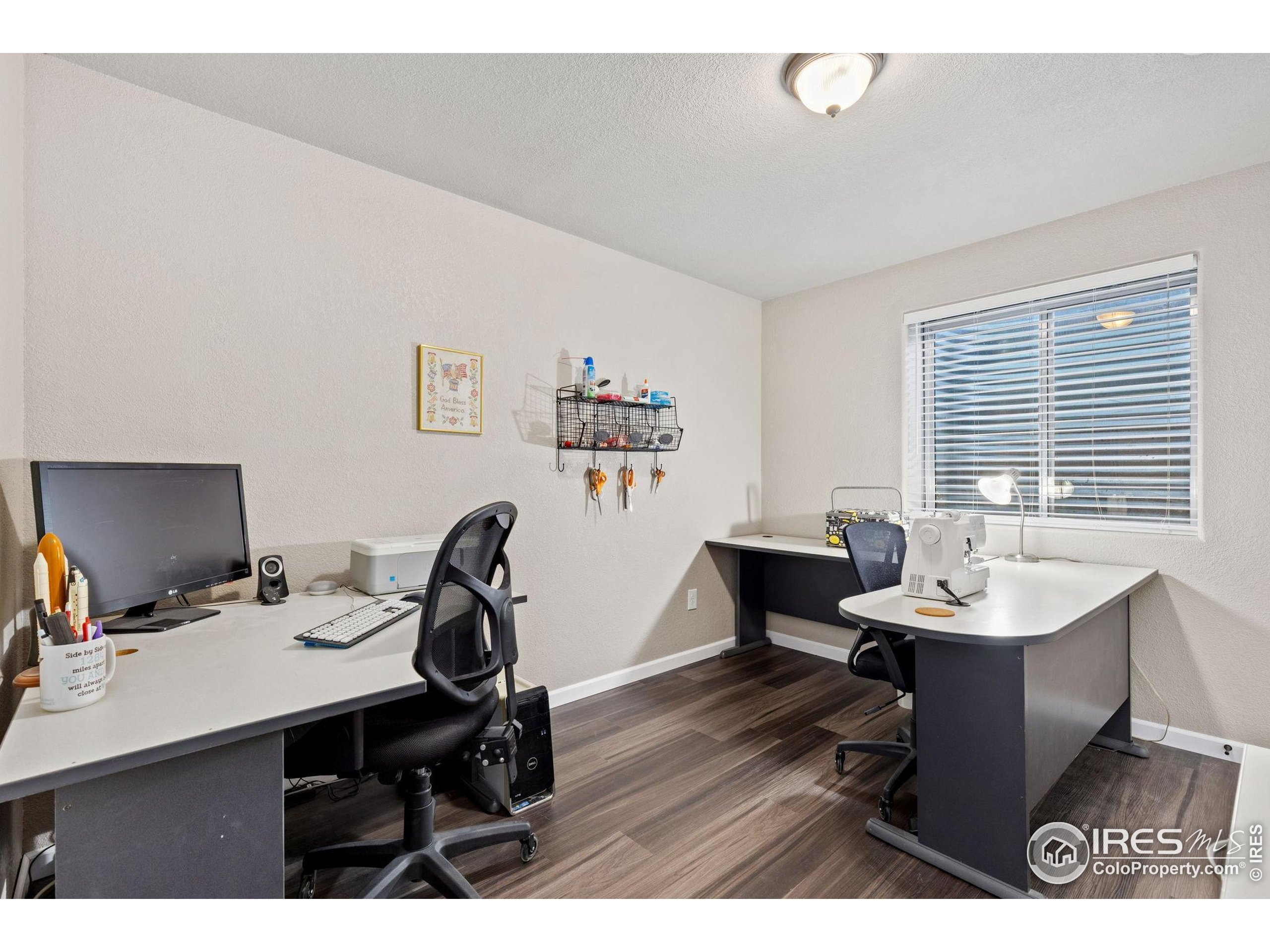 10166 Scenic Court Firestone, CO 80504 - Photo 23 of 33 a workspace with furniture and window