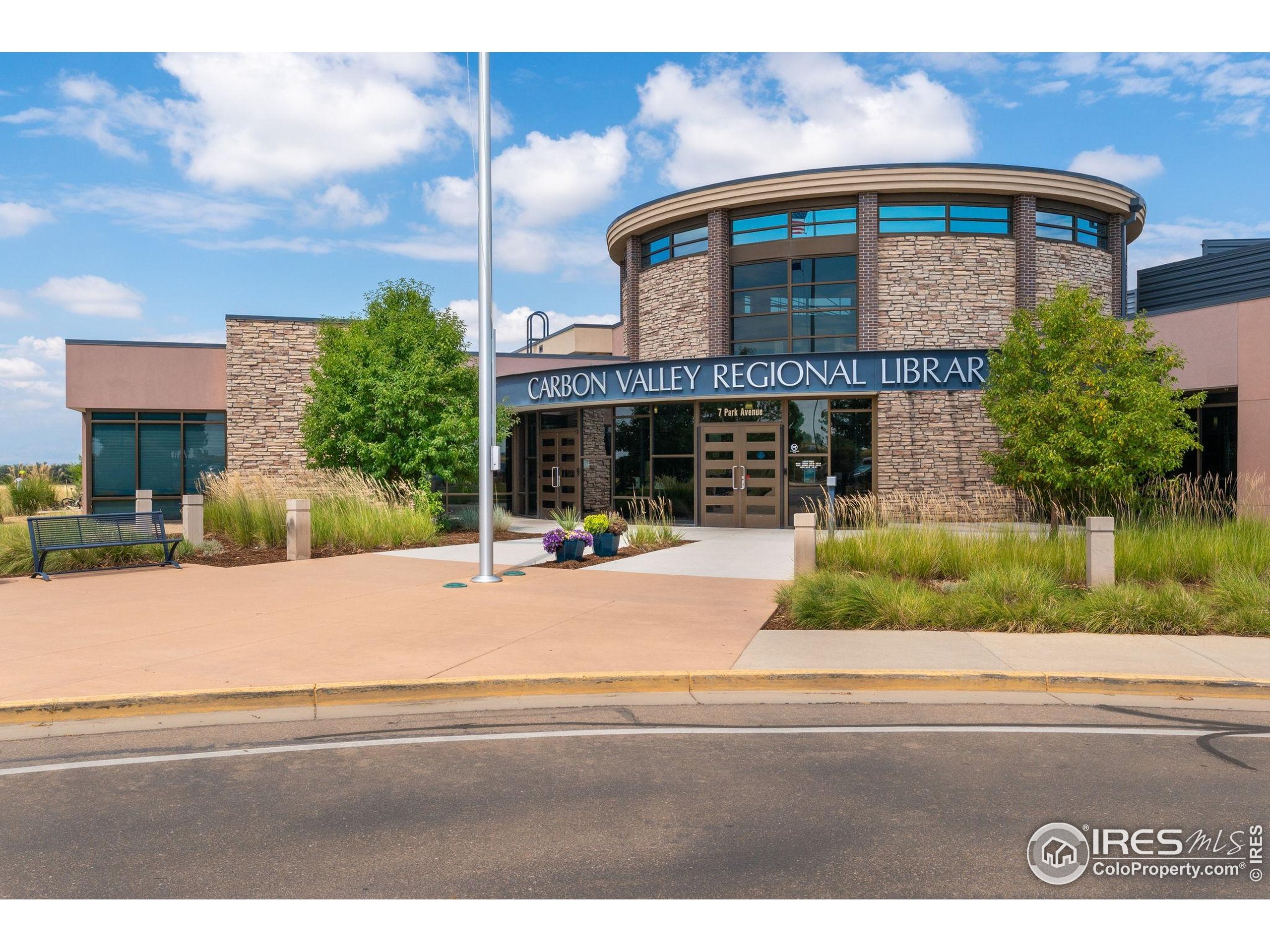 10166 Scenic Court Firestone, CO 80504 - Photo 29 of 33 a front view of a house with a garden