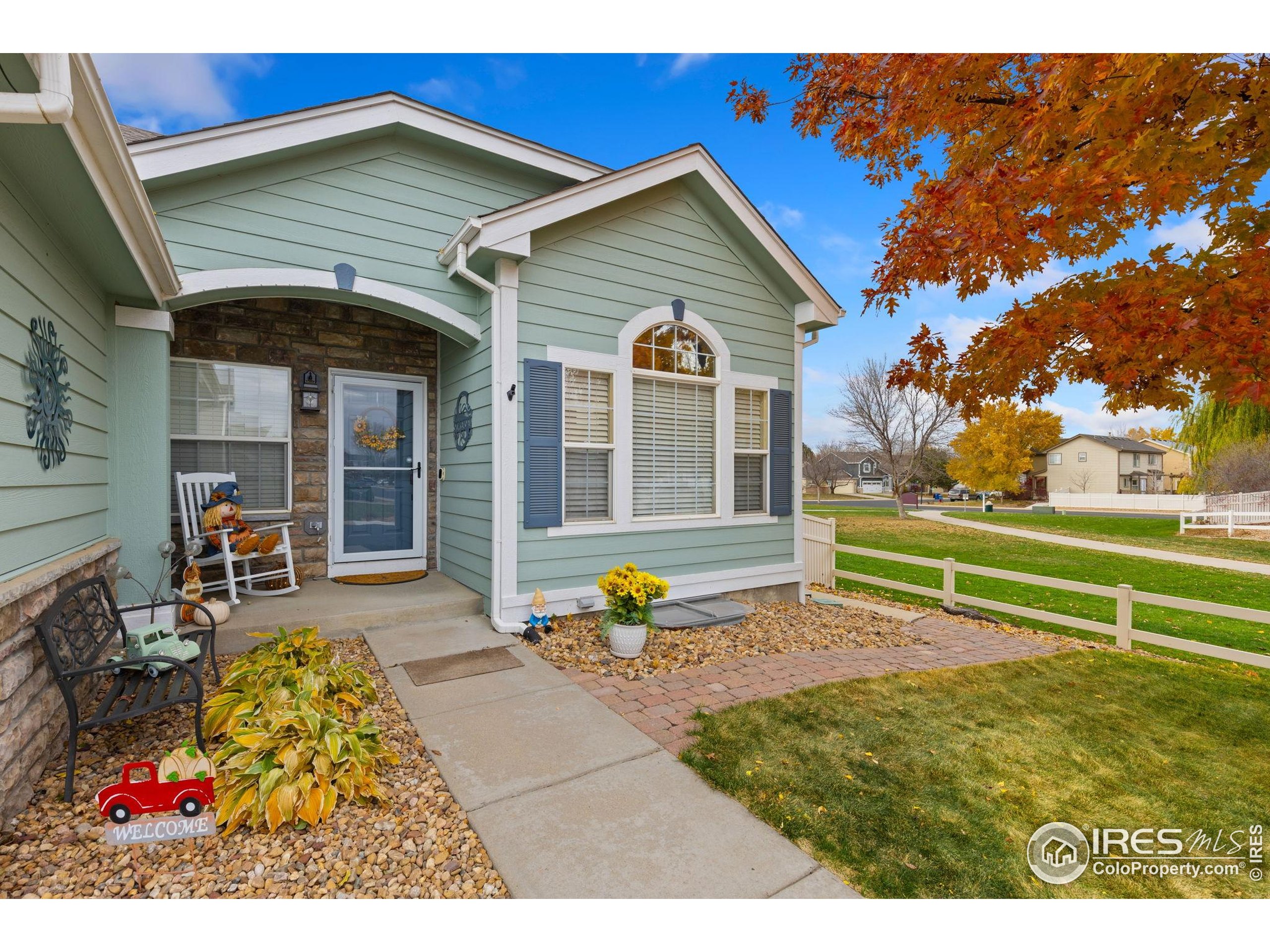 10166 Scenic Court Firestone, CO 80504 - Photo 3 of 33 a view of a house with backyard porch and sitting area