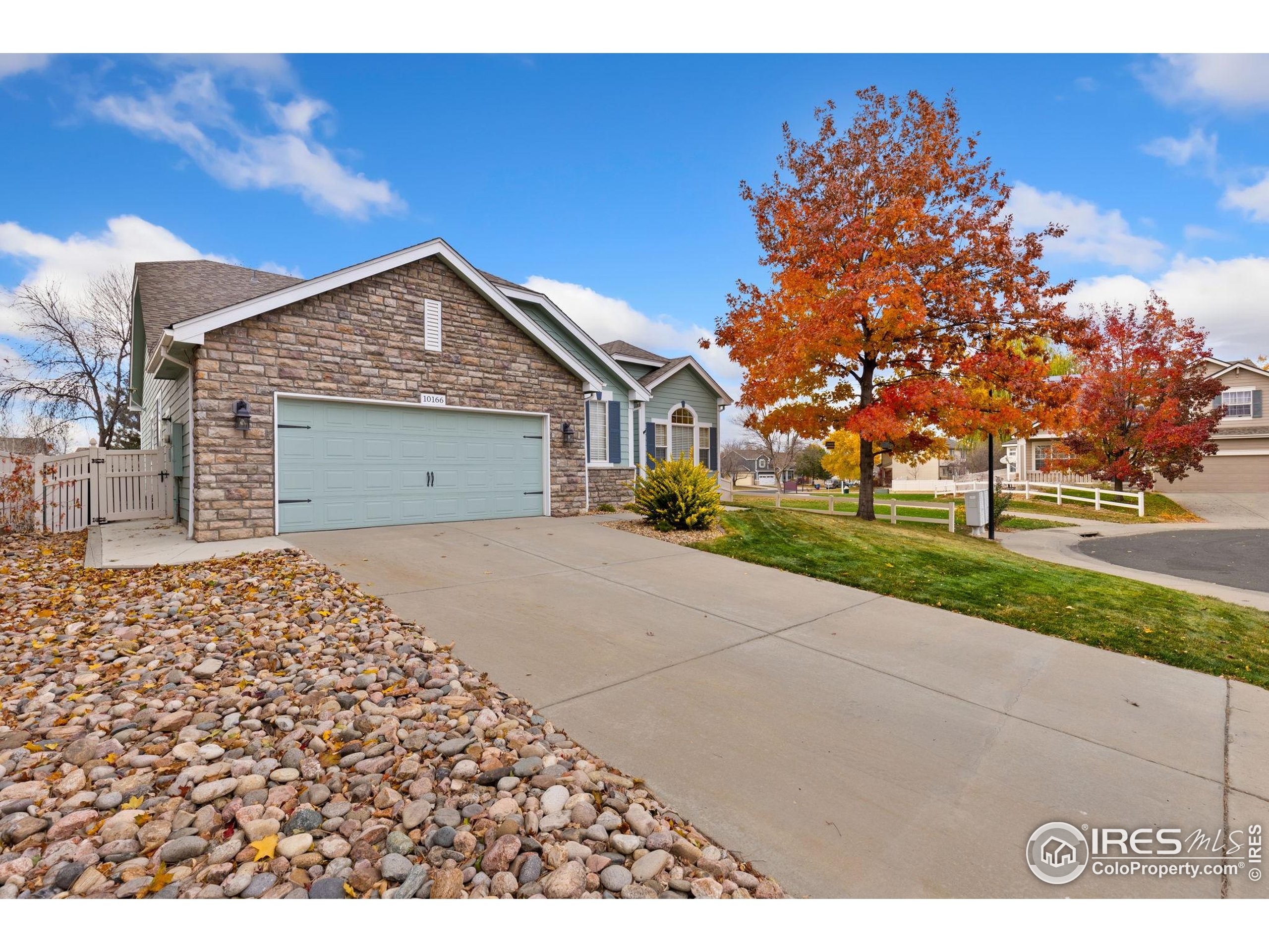 10166 Scenic Court Firestone, CO 80504 - Photo 5 of 33 a view of a house with a yard