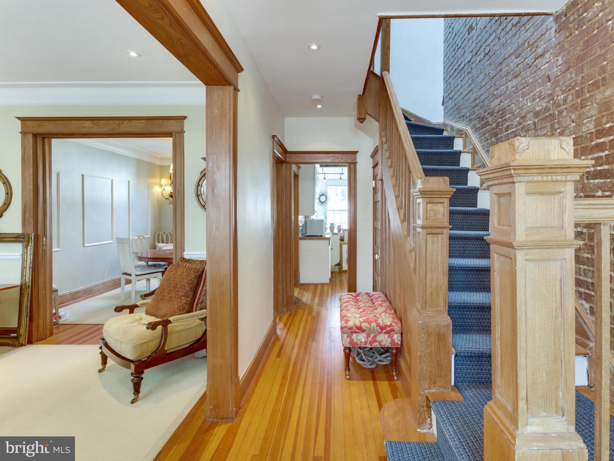 1654 33rd Street Northwest Washington, DC 20007 - Photo 3 of 17 a living room with furniture and wooden floor