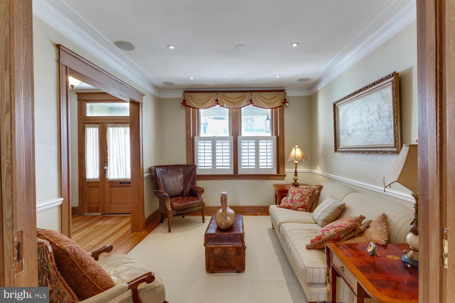 1654 33rd Street Northwest Washington, DC 20007 - Photo 5 of 17 a living room with furniture and large windows
