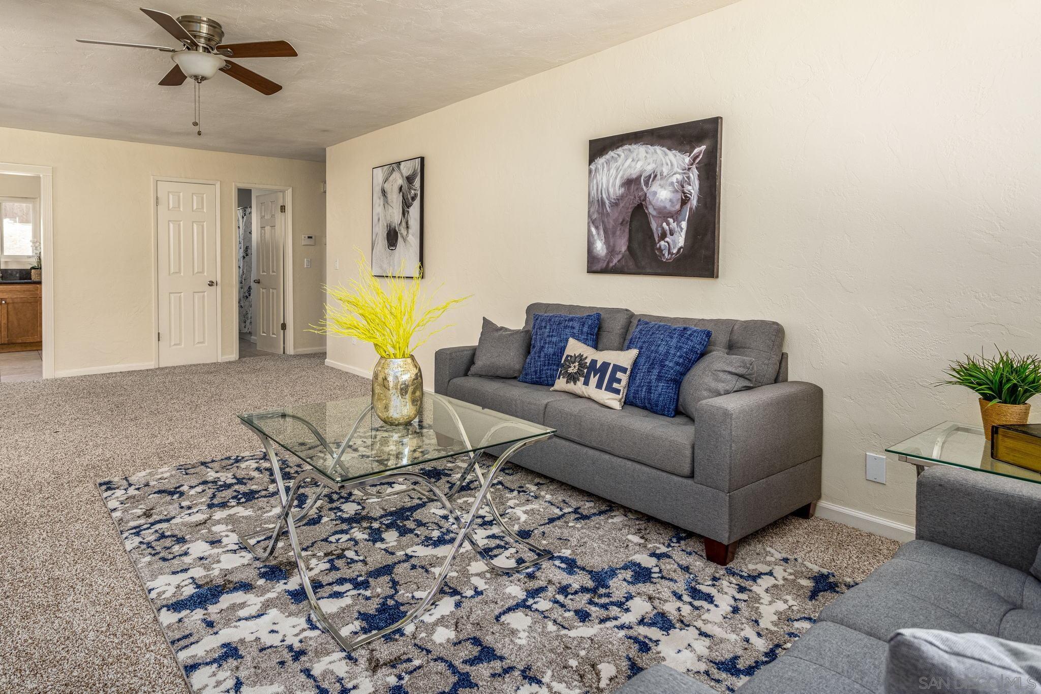6643 San Miguel Lemon Grove, CA 91945 - Photo 16 of 34 a living room with a couch