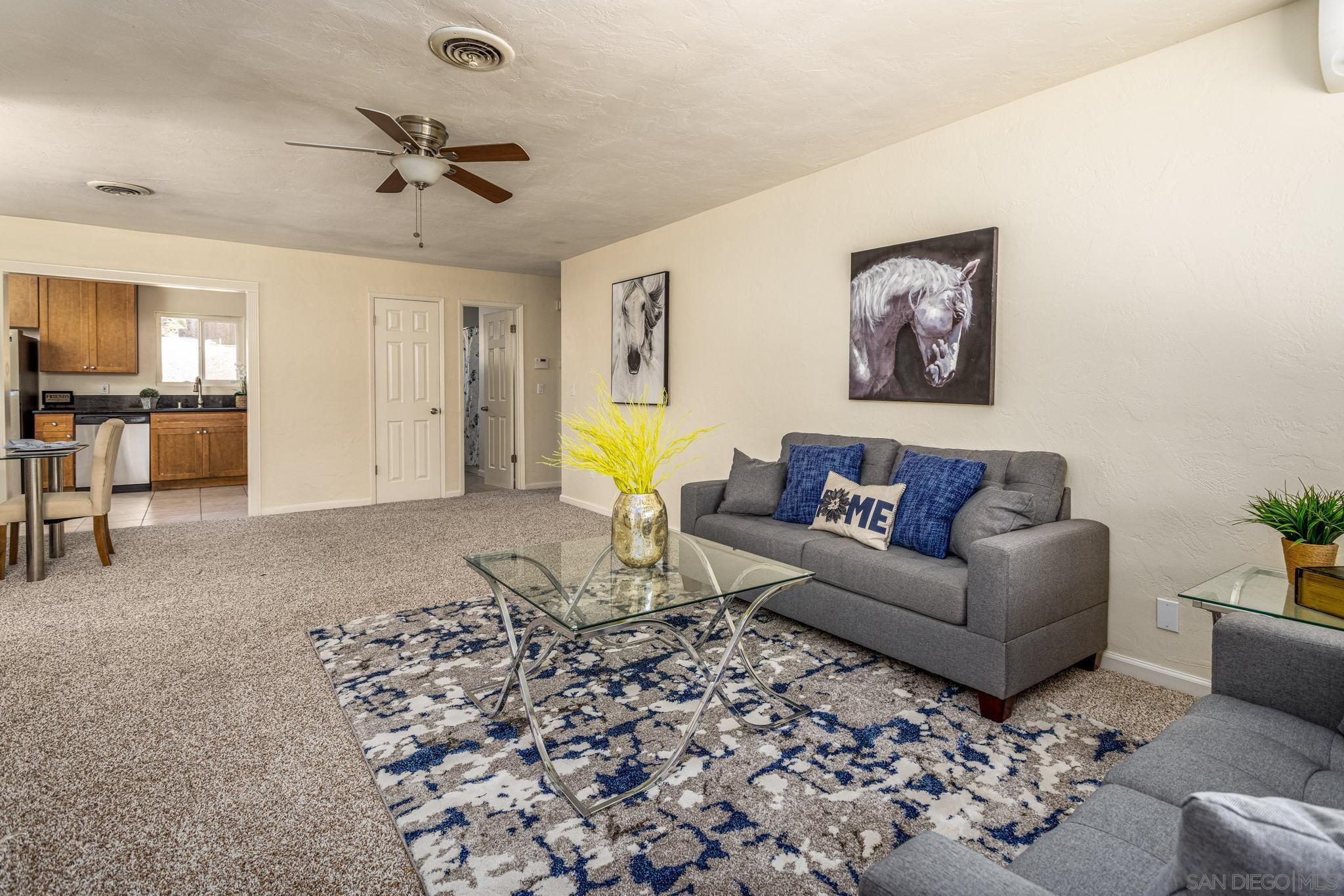 6643 San Miguel Lemon Grove, CA 91945 - Photo 17 of 34 a living room with furniture and wooden floor