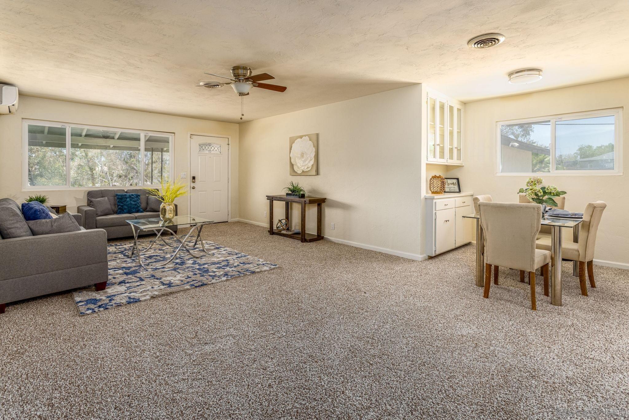 6643 San Miguel Lemon Grove, CA 91945 - Photo 27 of 34 a living room with furniture and a large window