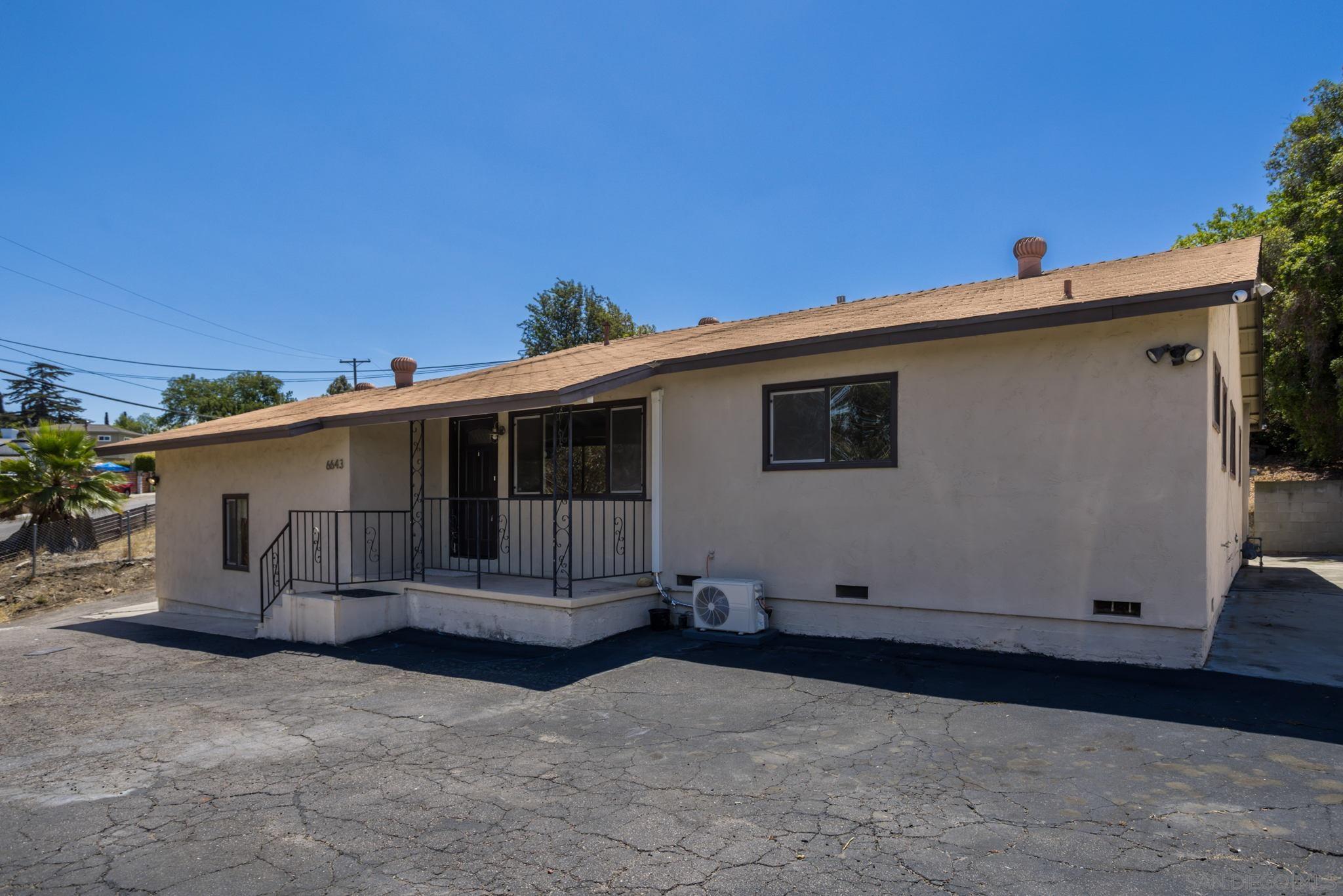 6643 San Miguel Lemon Grove, CA 91945 - Photo 10 of 34 a view of a house with a backyard