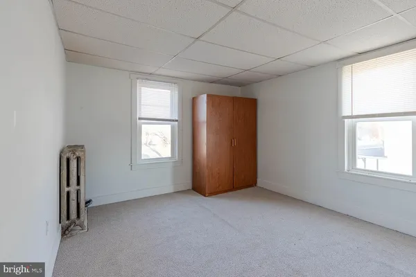 an empty room with windows