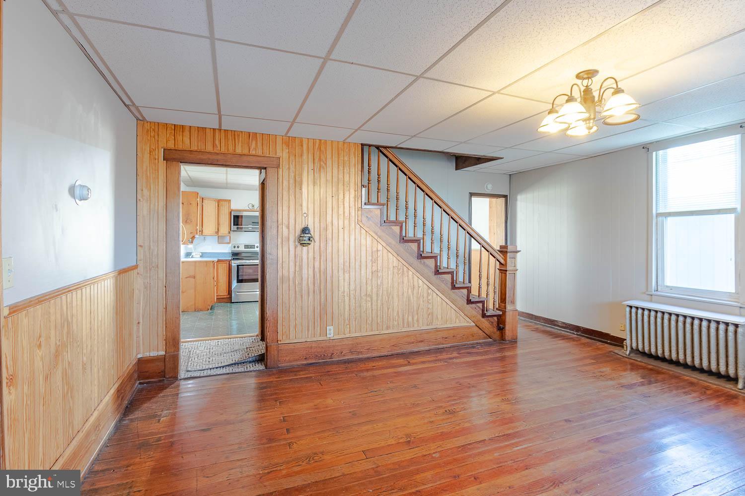 200 Stumptown Road Osceola Mills, PA 16666 - Photo 5 of 30 wooden floor in an empty room with a window