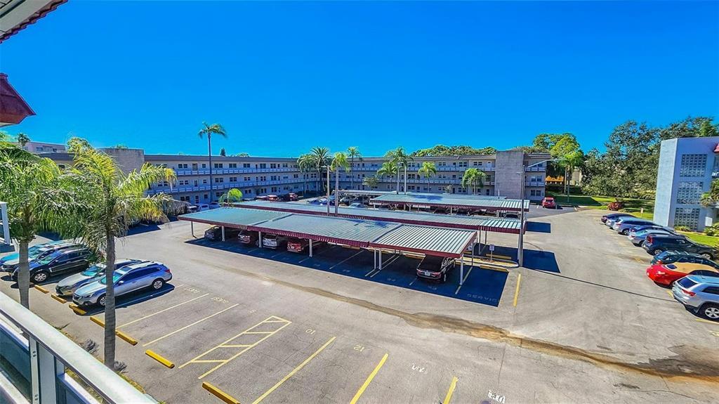 5660 80th Street North, Unit A303 St. Petersburg, FL 33709 - Photo 26 of 72 a view of a terrace with furniture
