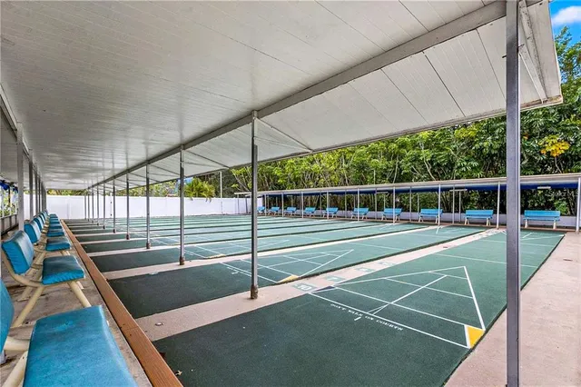 a room with furniture and white walls