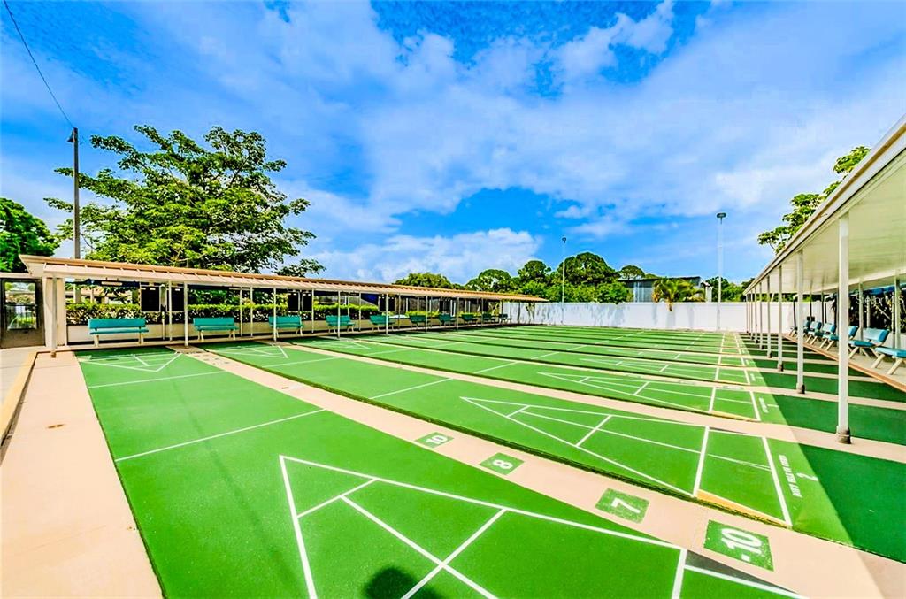 5660 80th Street North, Unit A303 St. Petersburg, FL 33709 - Photo 66 of 72 a view of a tennis court