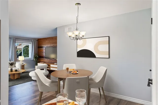 a view of a room with window and wooden floor