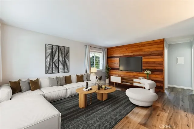 a view of room with wooden floor and window