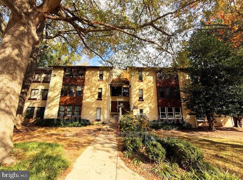 a front view of house with a yard