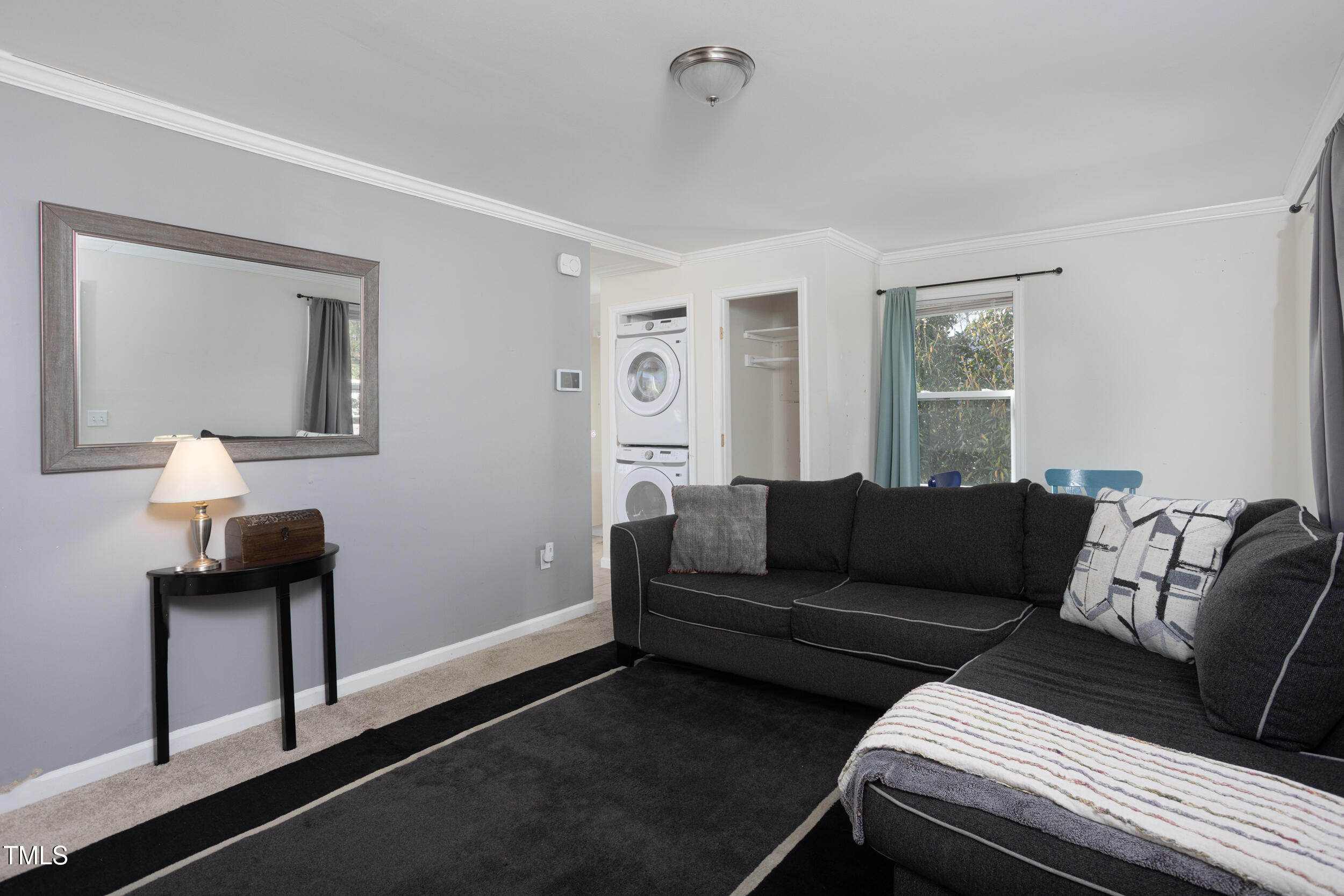 2701 Newbold Street Raleigh, NC 27603 - Photo 3 of 15 a living room with furniture and a window