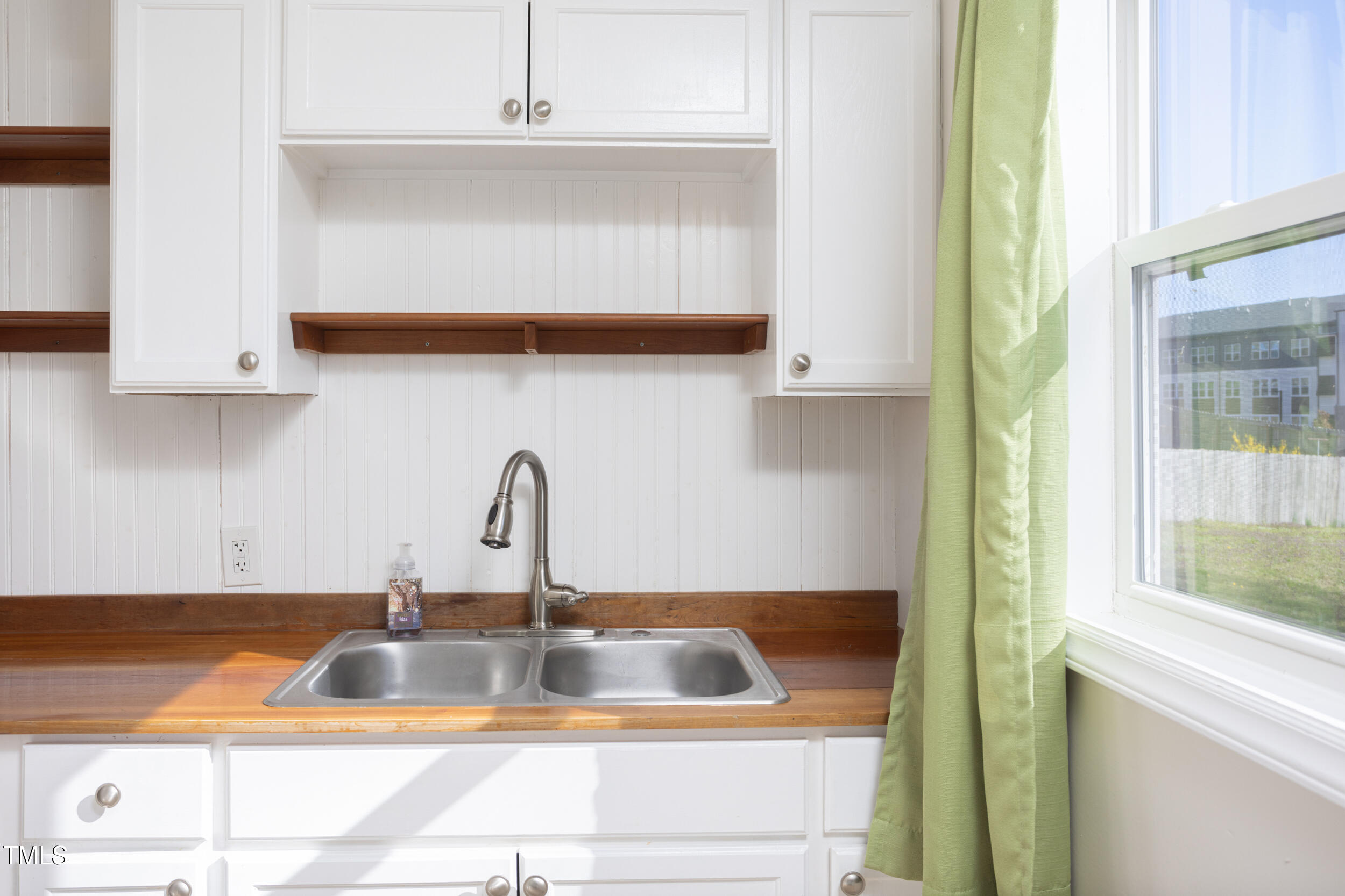 2701 Newbold Street Raleigh, NC 27603 - Photo 6 of 15 a close view of sink and tap
