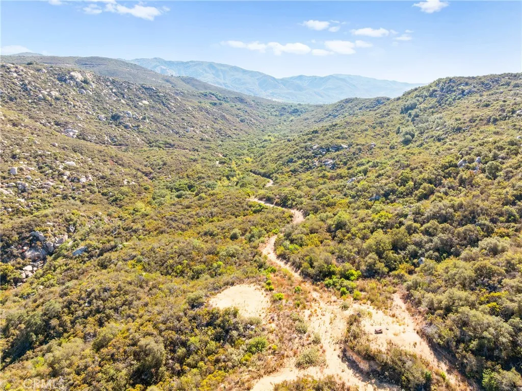 0 Pala Temecula Rd Valley Center Valley Center, CA 92082 - Photo 33 of 39 view of a mountain range with a lush green hillside
