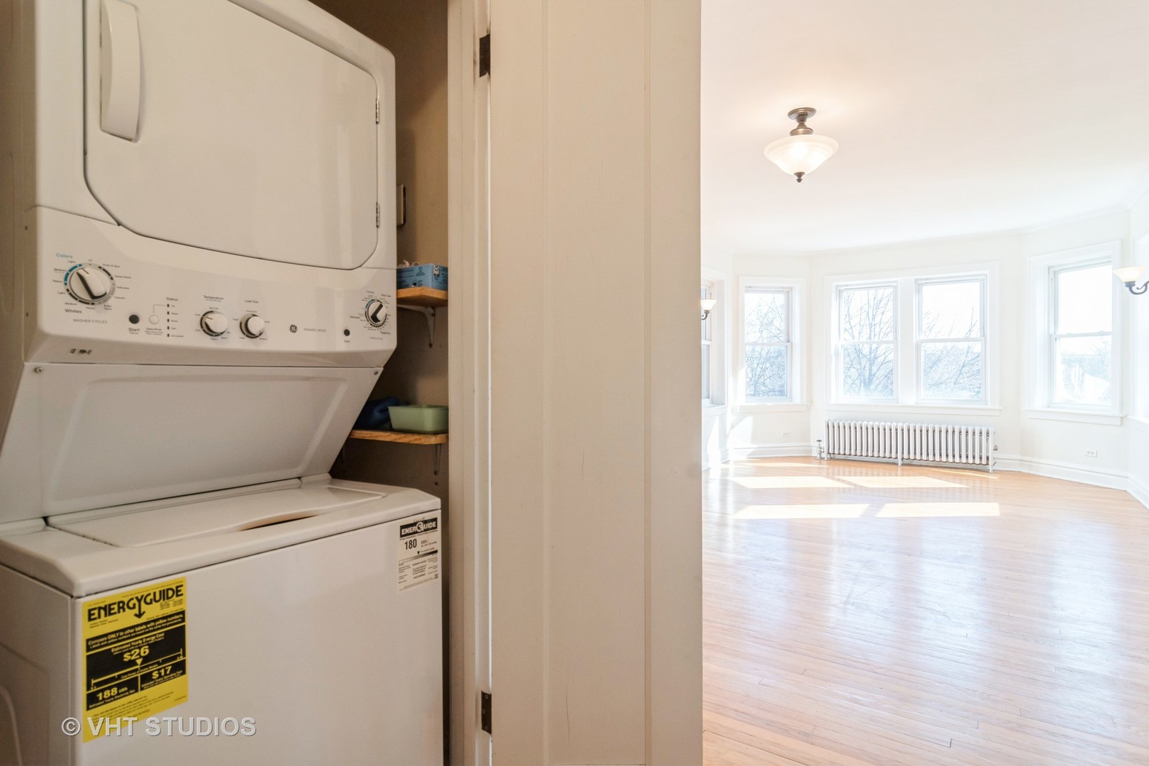2901 West Arthur Avenue, Unit 3 Chicago, IL 60645 - Photo 11 of 13 a view of washer and dryer with bathroom