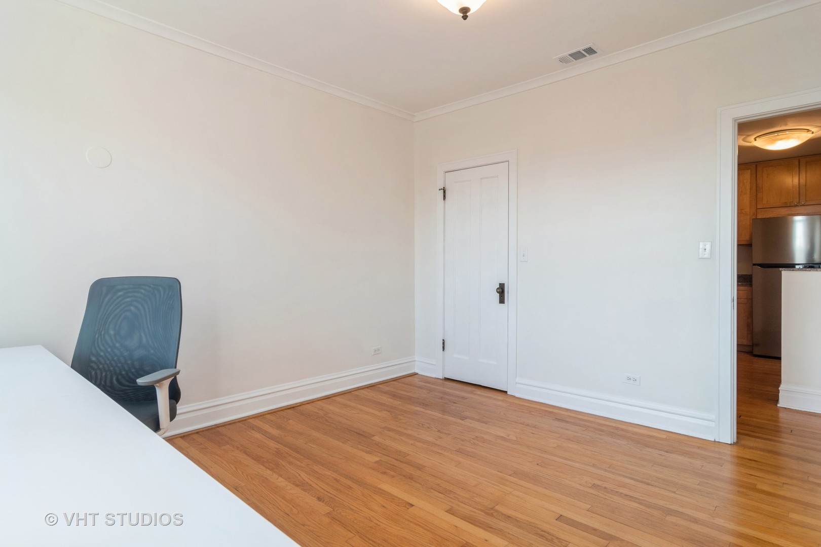 2901 West Arthur Avenue, Unit 3 Chicago, IL 60645 - Photo 9 of 13 a view of room with furniture and wooden floor