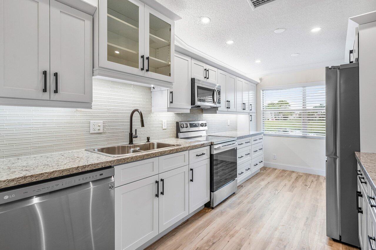 840 Lago Road Delray Beach, FL 33445 - Photo 9 of 39 009-840LagoRoad-DelrayBeach-FL-33445-SMA