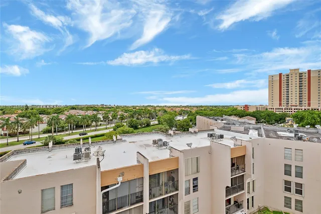 a view of a city with tall buildings
