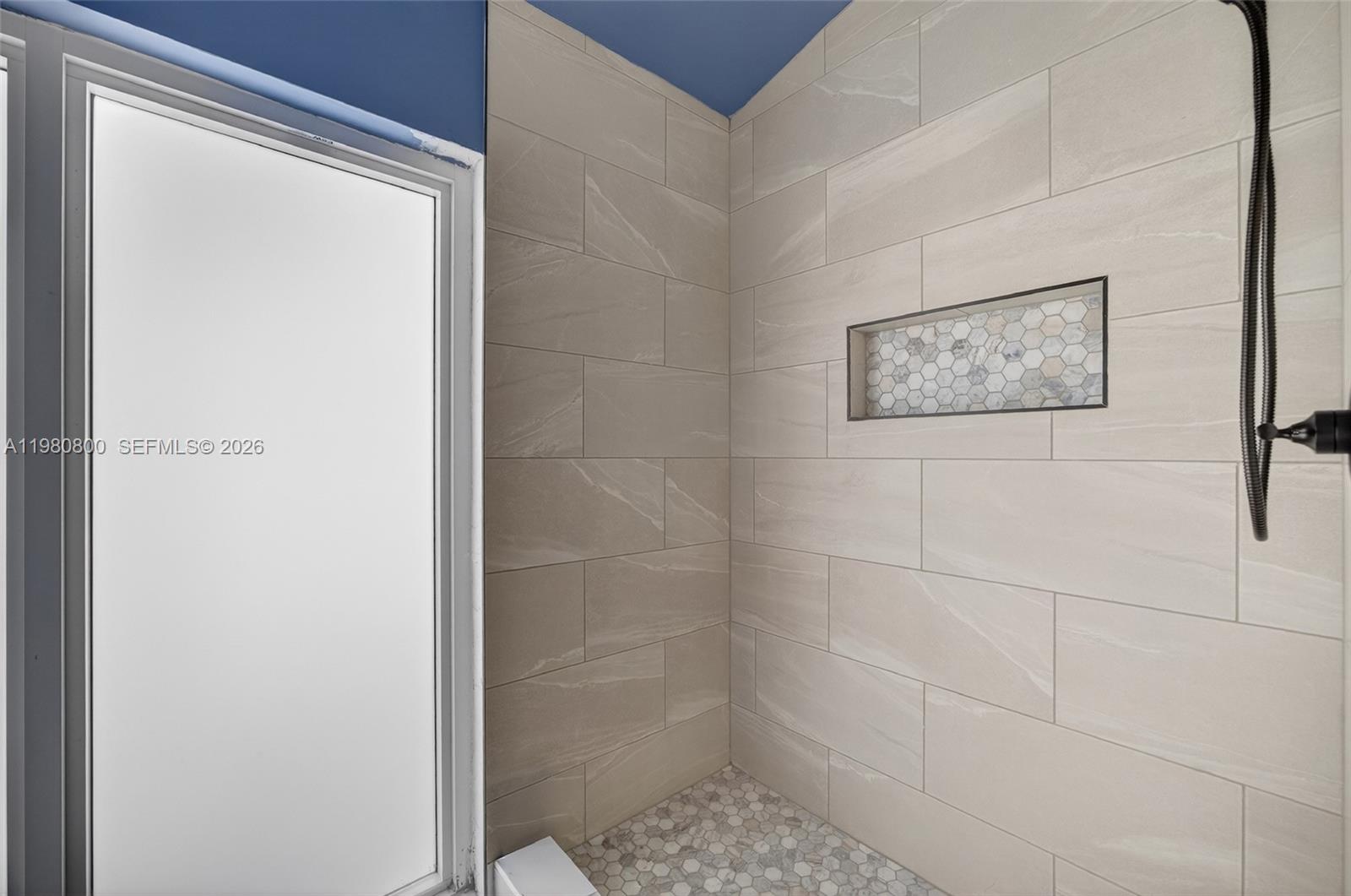 15260 Southwest 57th Street Miami, FL 33193 - Photo 11 of 22 a bathroom with a shower