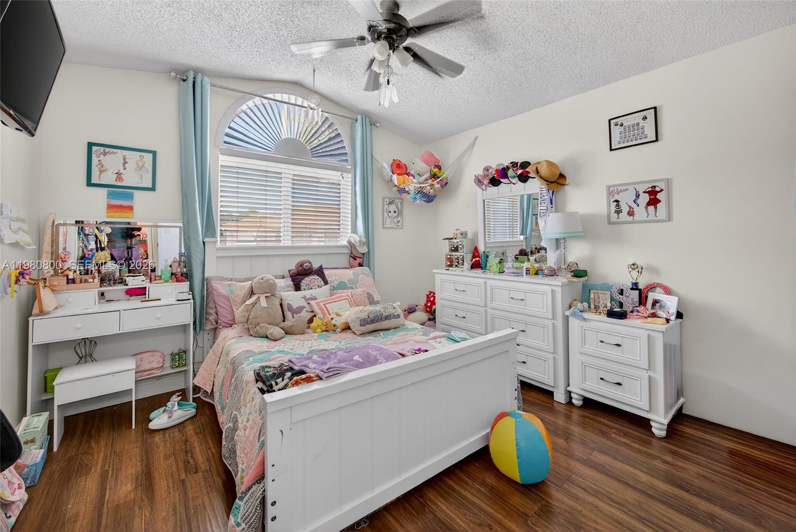 15260 Southwest 57th Street Miami, FL 33193 - Photo 13 of 22 a bedroom with a bed and a window