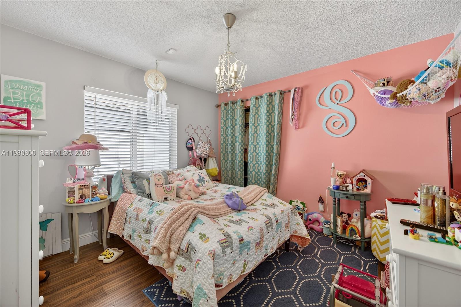 15260 Southwest 57th Street Miami, FL 33193 - Photo 16 of 22 a bedroom with bed and a window