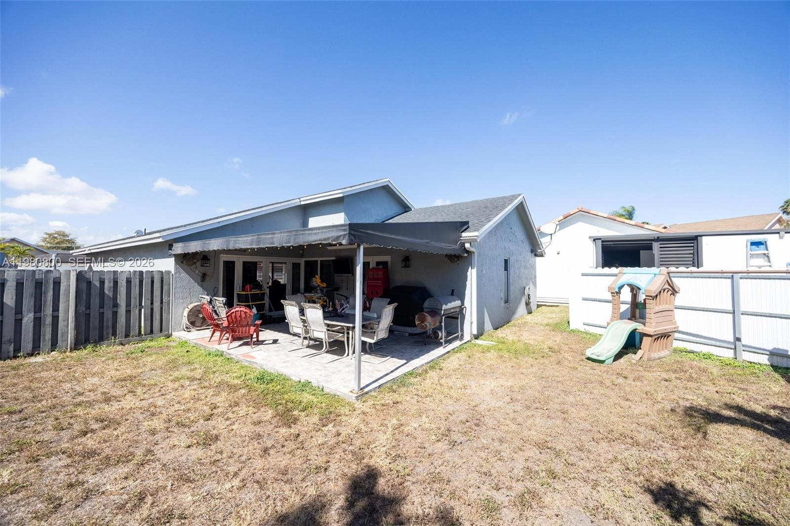 15260 Southwest 57th Street Miami, FL 33193 - Photo 17 of 22 a view of a backyard