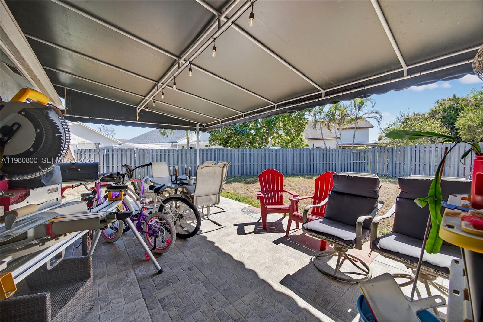 15260 Southwest 57th Street Miami, FL 33193 - Photo 20 of 22 a outdoor space with patio lots of furniture