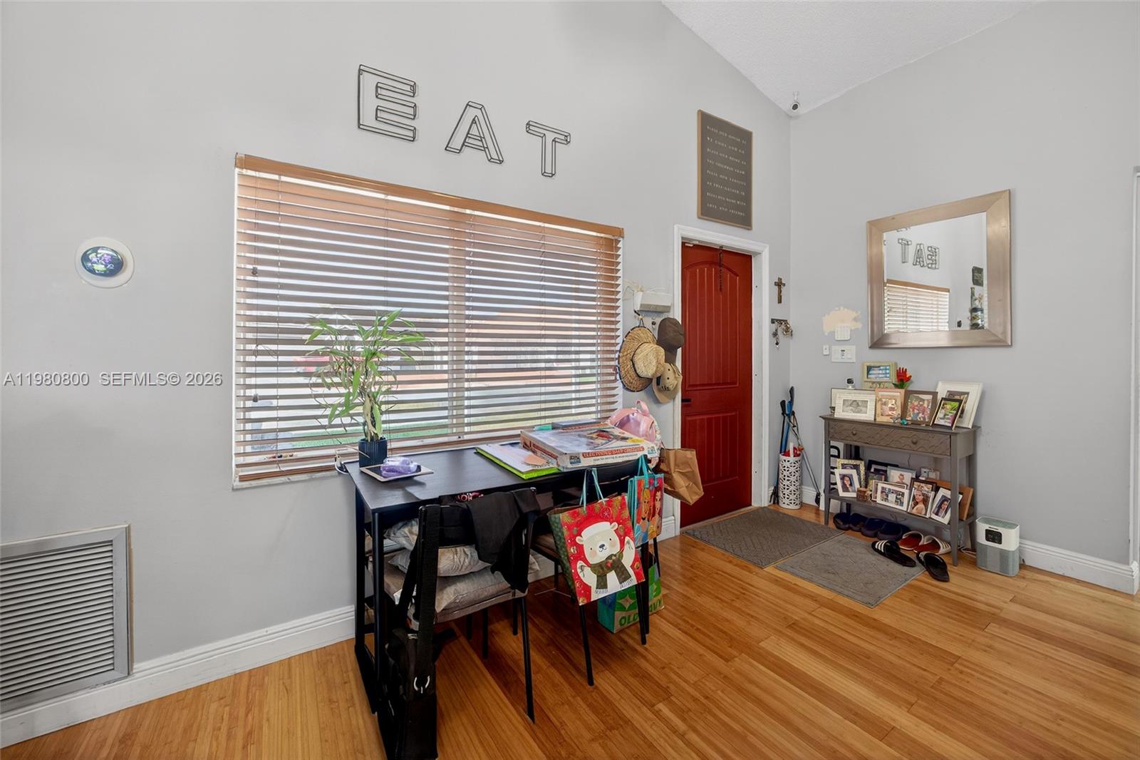 15260 Southwest 57th Street Miami, FL 33193 - Photo 5 of 22 a view of a workspace with furniture and a window