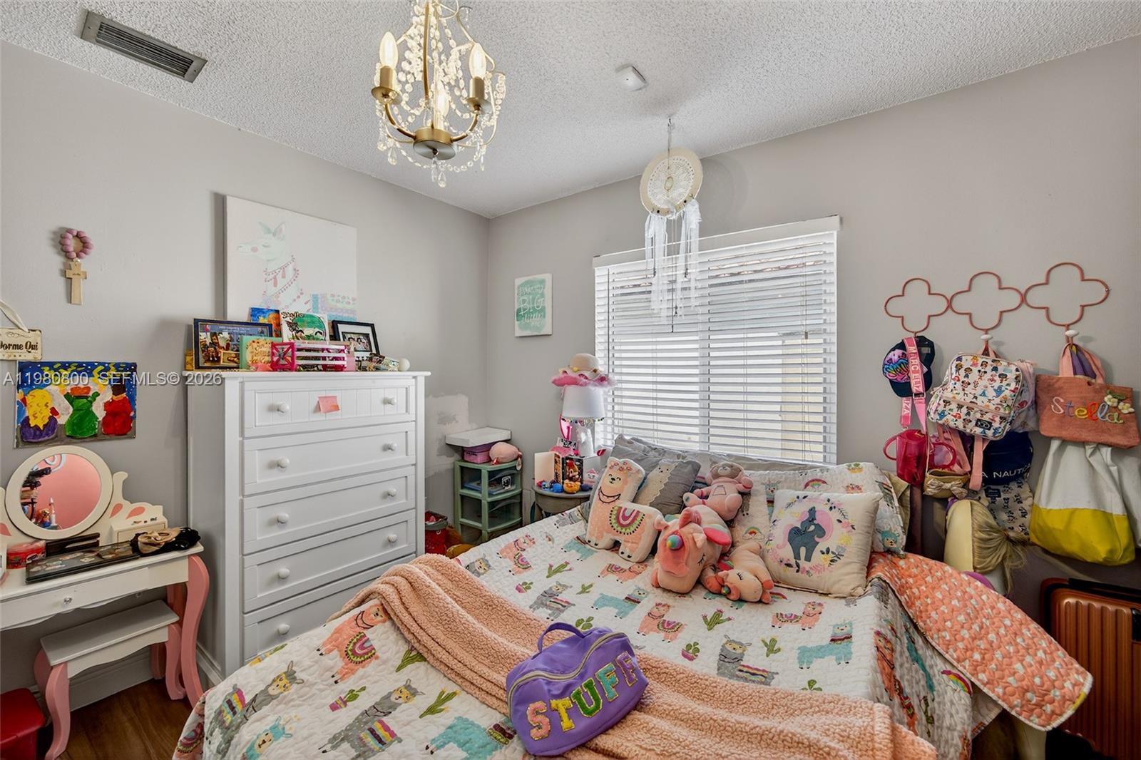 15260 Southwest 57th Street Miami, FL 33193 - Photo 9 of 22 a bedroom with furniture and a window