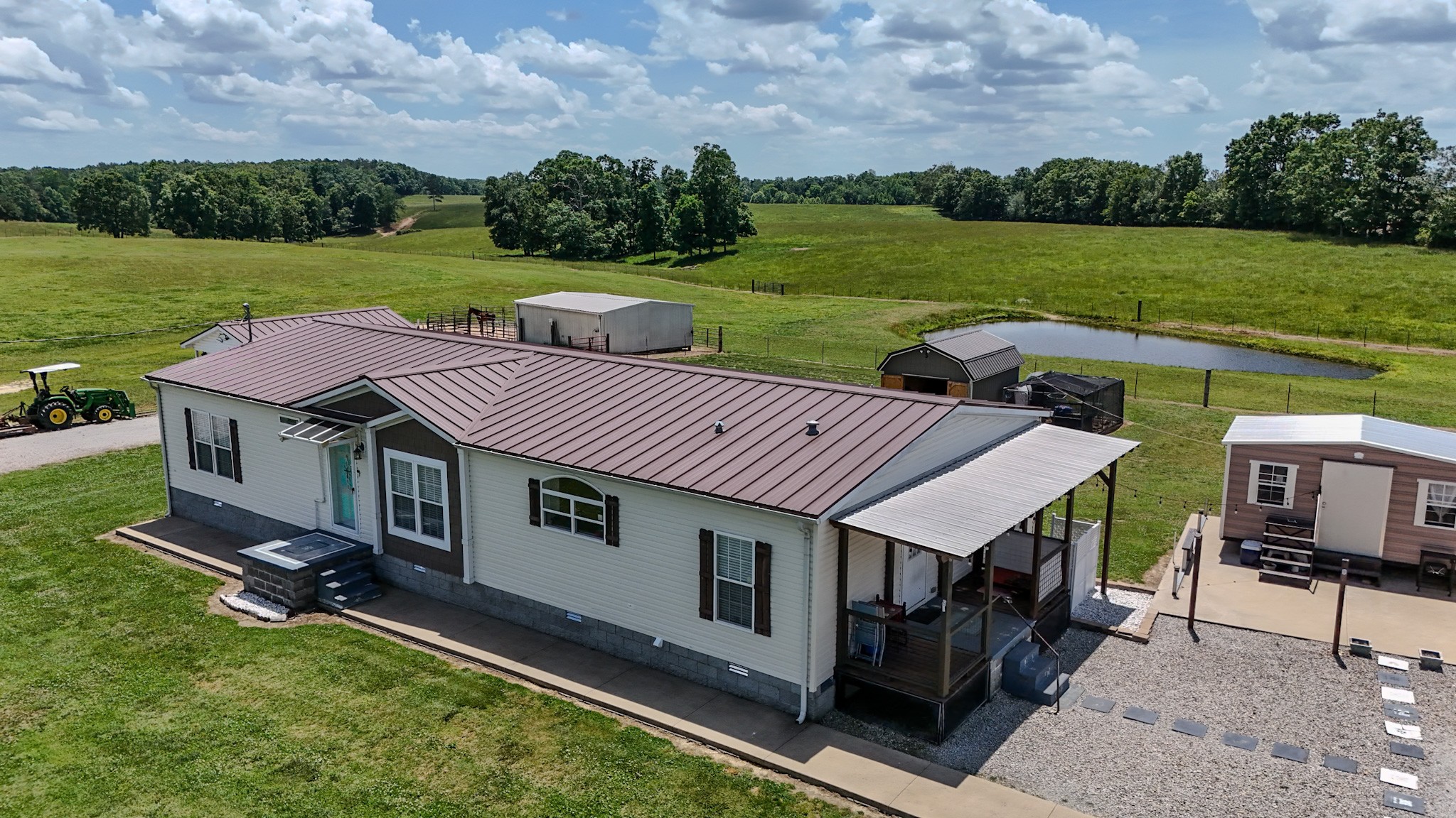 1198 David Patterson Road Lutts, TN 38471 - Photo 34 of 82 a view of a house with pool and a yard