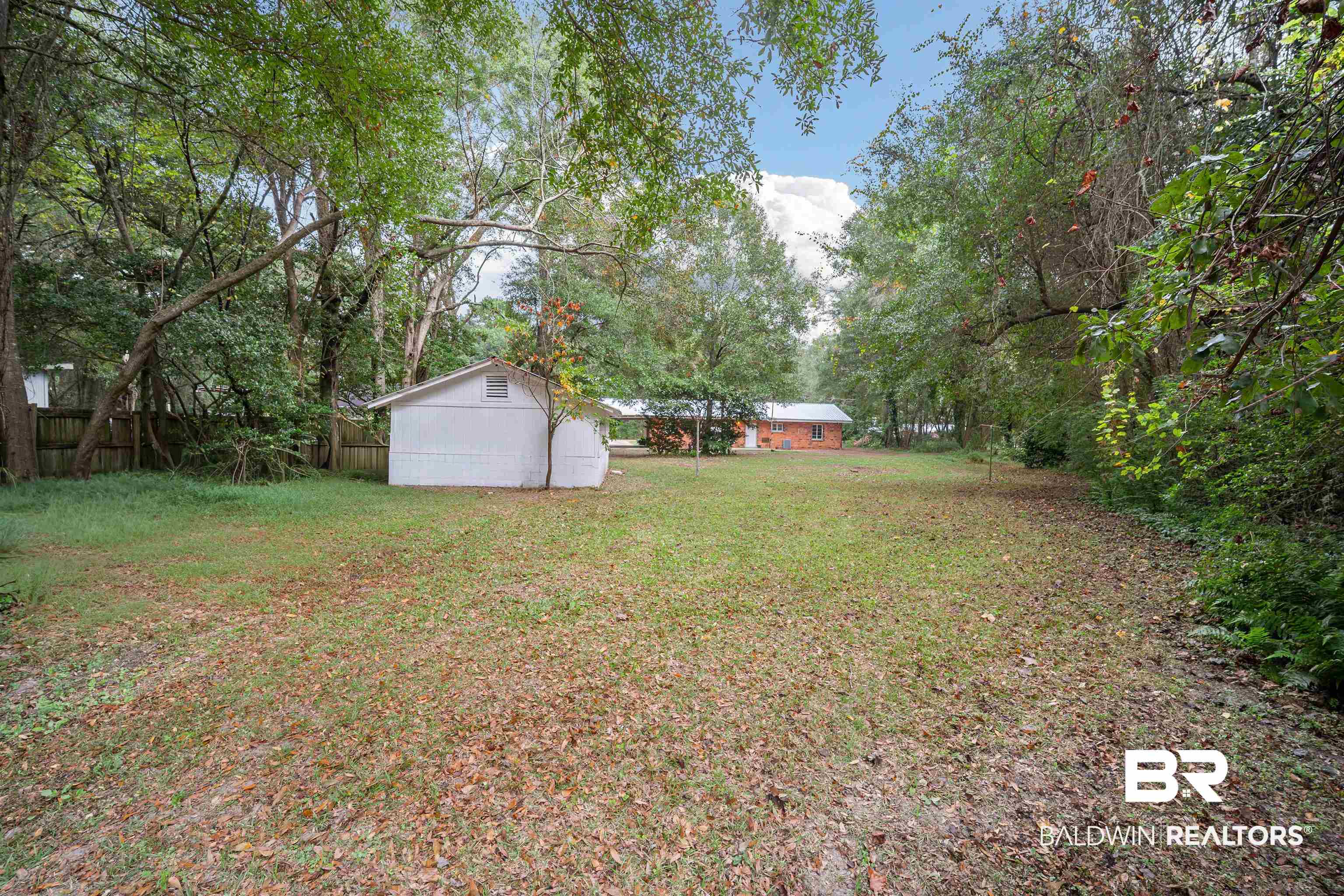 2261 Island Road Mobile, AL 36605 - Photo 23 of 25 View of yard featuring an outbuilding