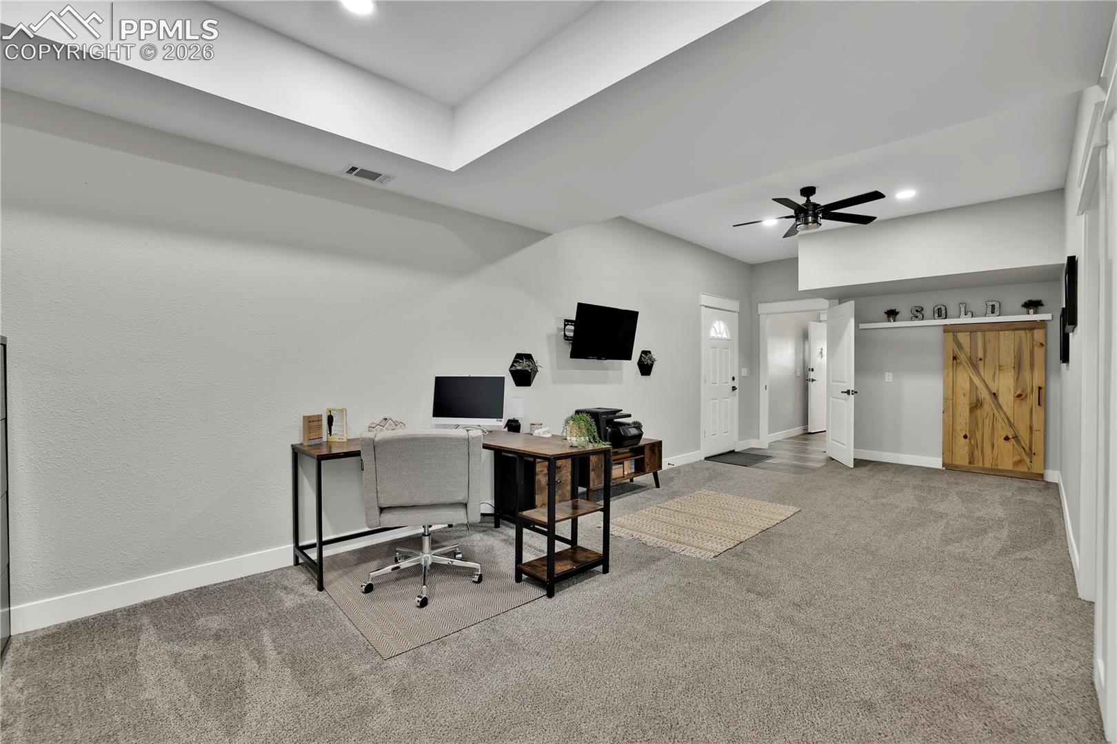 18135 Spur Ranch Road Peyton, CO 80831 - Photo 26 of 50 Extra Living room flex space