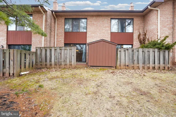 a house view with a backyard space