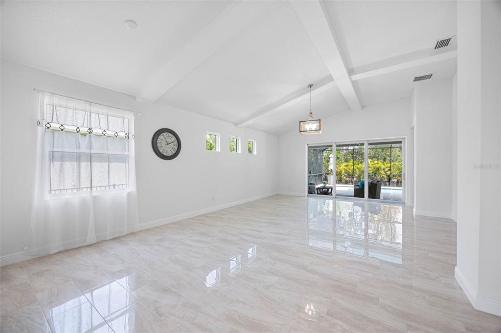12739 Rainwashed Loop Parrish, FL 34219 - Photo 18 of 45 a view of a livingroom with a white furniture