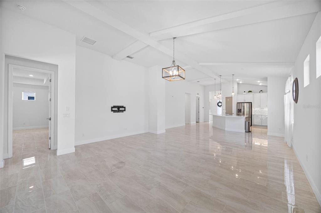 12739 Rainwashed Loop Parrish, FL 34219 - Photo 20 of 45 a view of a big room with wooden cabinet and windows