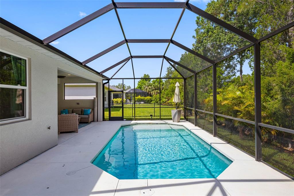 12739 Rainwashed Loop Parrish, FL 34219 - Photo 35 of 45 a view of a porch with furniture