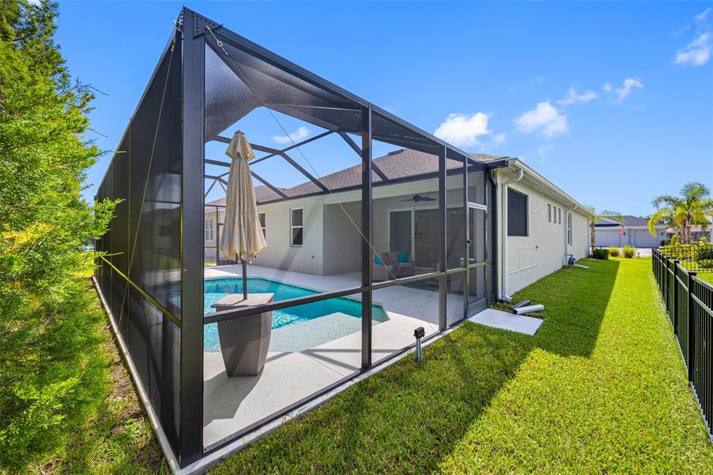 12739 Rainwashed Loop Parrish, FL 34219 - Photo 38 of 45 a view of house with a yard