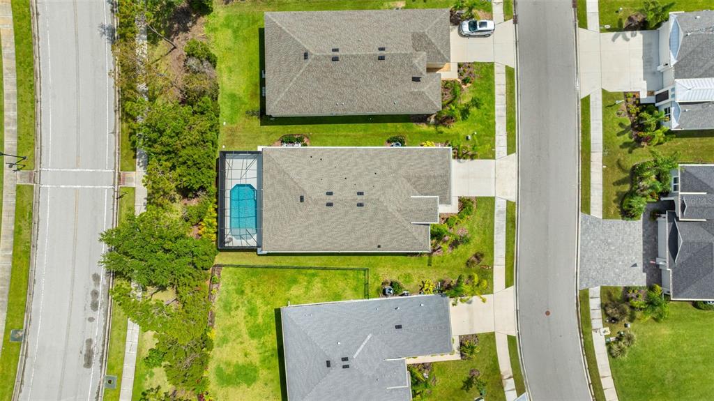 12739 Rainwashed Loop Parrish, FL 34219 - Photo 41 of 45 an aerial view of a house with a garden