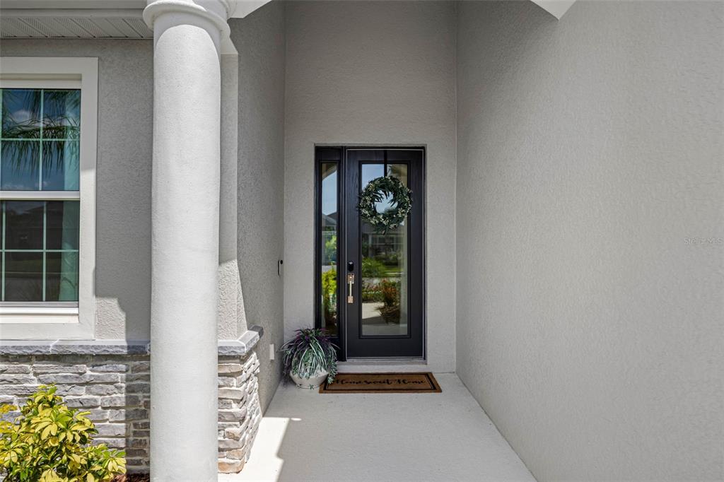 12739 Rainwashed Loop Parrish, FL 34219 - Photo 6 of 45 a view of an entryway with a rug