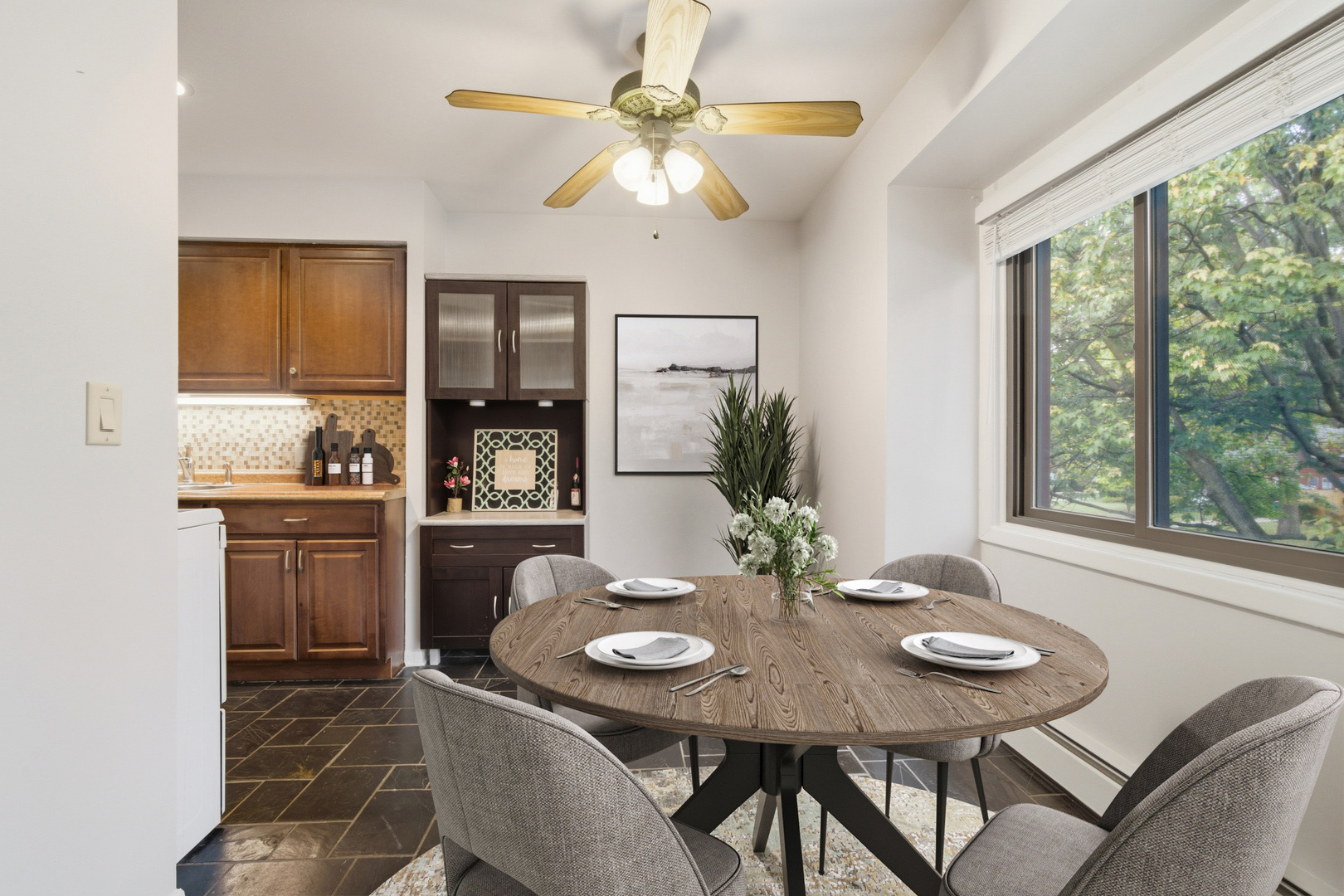 1341 Greenwillow Lane, Unit C Glenview, IL 60025 - Photo 16 of 28 a view of a dining room with furniture window and outside view