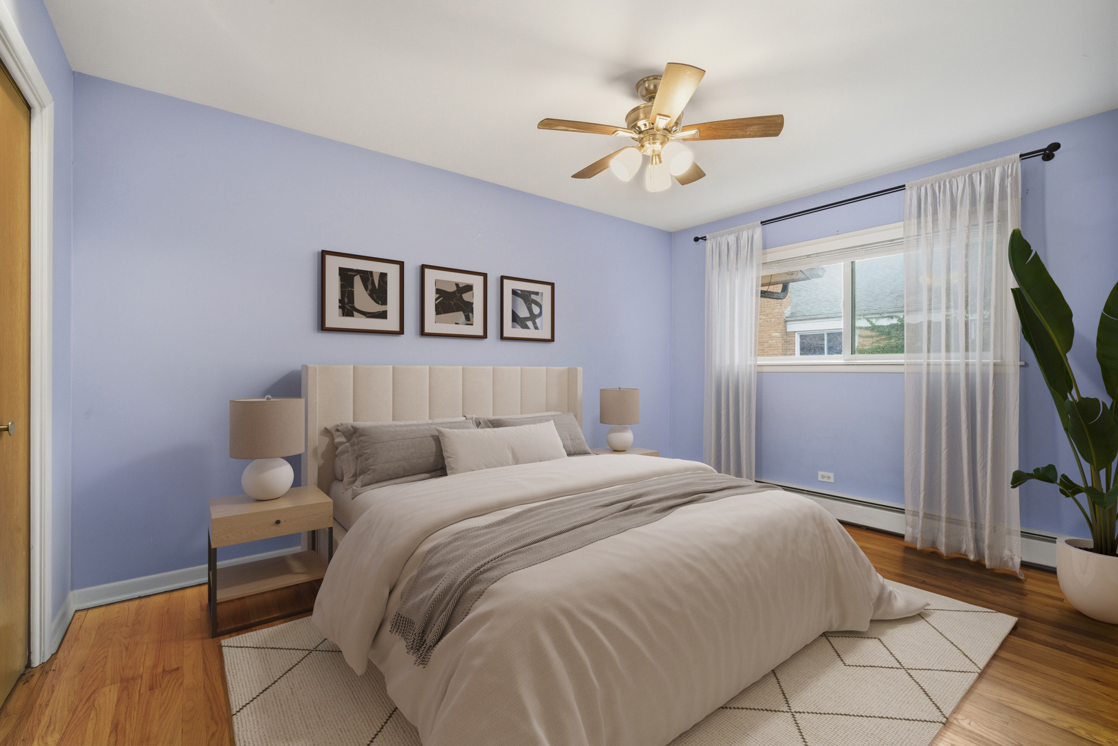 1341 Greenwillow Lane, Unit C Glenview, IL 60025 - Photo 21 of 28 a bedroom with a bed and a flat screen tv