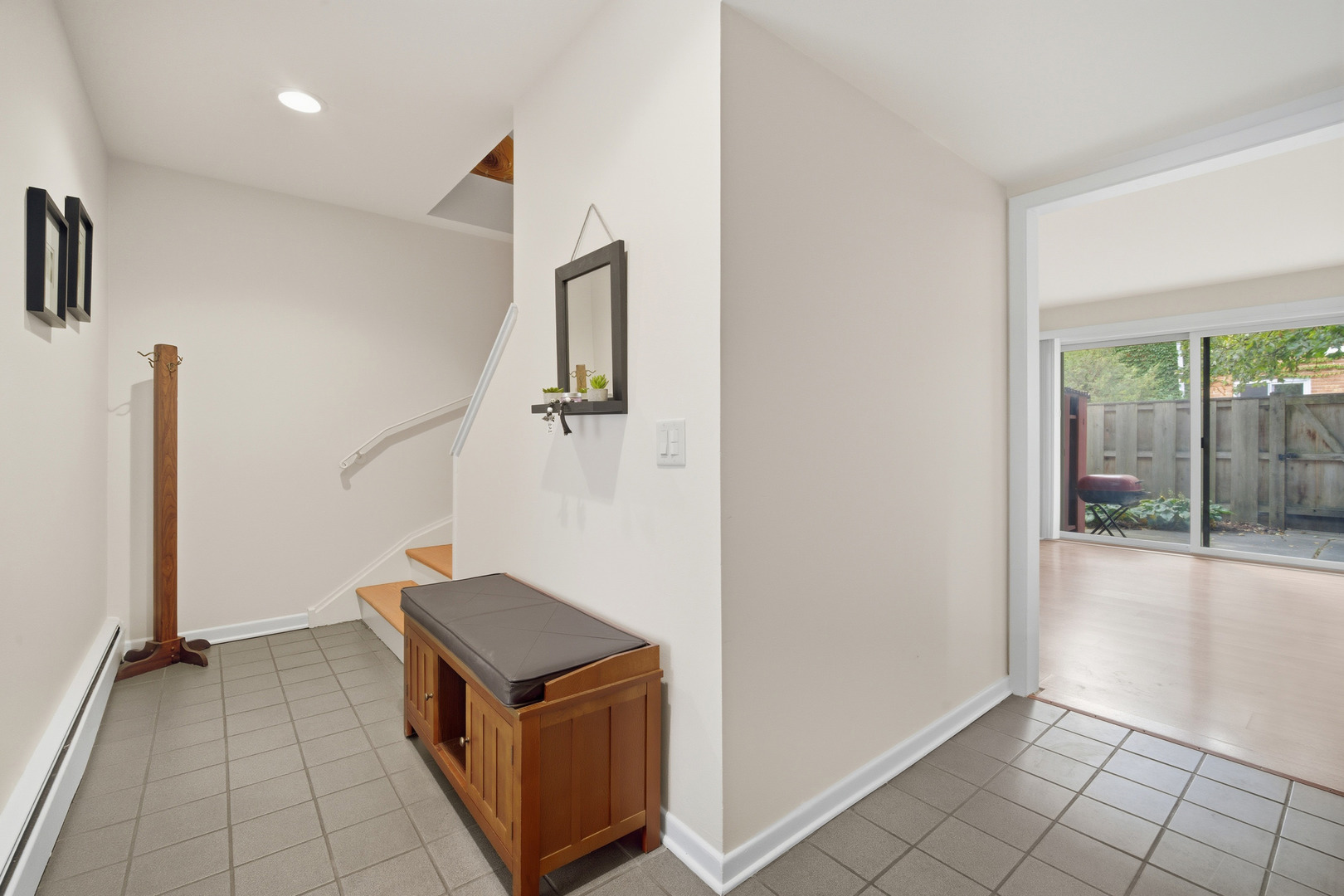 1341 Greenwillow Lane, Unit C Glenview, IL 60025 - Photo 4 of 28 a living room with a stove and a table