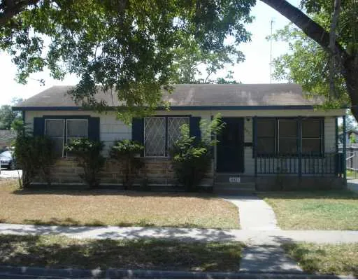 a view of house with yard