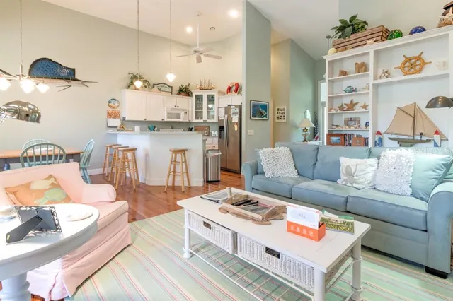 a living room with furniture and a table