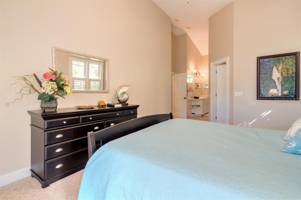 191 Kettle Harbor Drive Boca Grande, FL 33921 - Photo 21 of 50 a bed room with a bed and a dresser