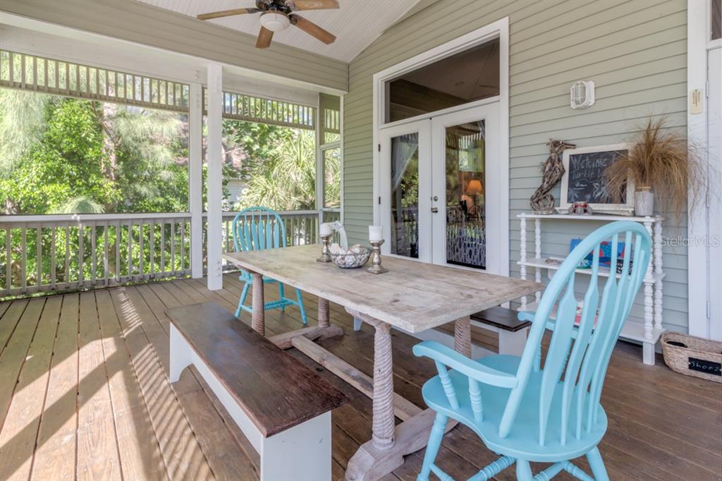 191 Kettle Harbor Drive Boca Grande, FL 33921 - Photo 38 of 50 a view of a dining room with furniture window and wooden floor